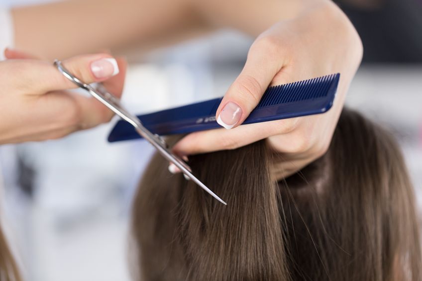 woman cutting hair